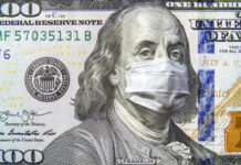 Benjamin Franklin on $100 bill wearing a surgical mask.