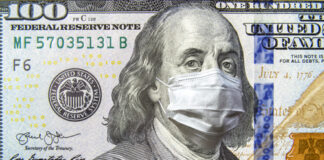 Benjamin Franklin on $100 bill wearing a surgical mask.