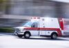 Ambulance speeding on a road