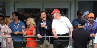 Group of people at Trump National Golf Course event.