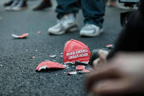 shutterstock1846878058jpg Broken Make America Great Again hat on the ground.