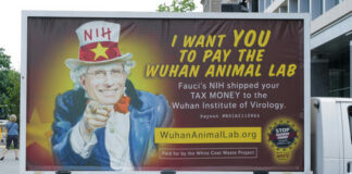 Truck billboard showing a message criticizing Anthony Fauci.