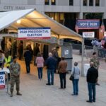People at a voting station for the 2028 presidential election outside city hall