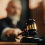 Defense Gambit Targets Death Row Path Judge's gavel striking sounding block in courtroom
