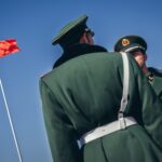 Pentagon Labels Alibaba, Baidu, BYD Military-Linked Military personnel monitoring operations in a high-tech command center