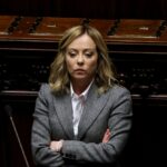 Trump Torches Meloni—Italy Fires Back Hand signing a document with a pen