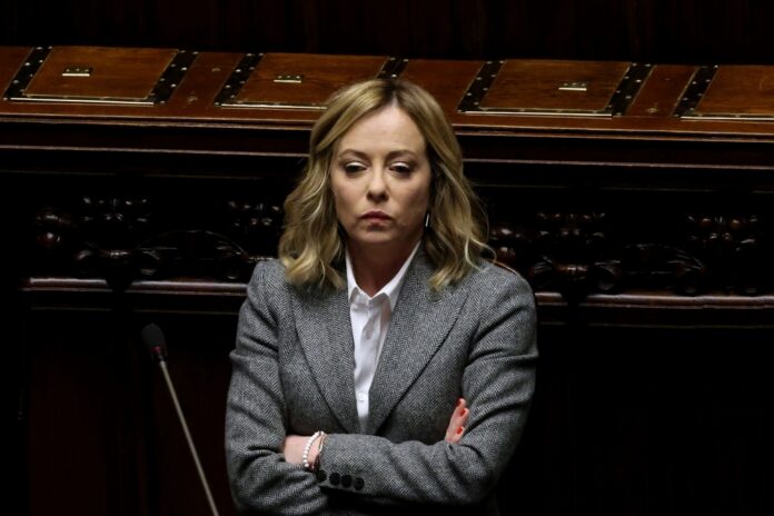 Rome,,Italy,-,January,24,,2024:,Giorgia,Meloni,,Italy's,Prime Hand signing a document with a pen