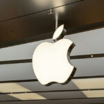 Silicon Valley Cage Match: Apple Strikes Illuminated Apple logo inside a store.