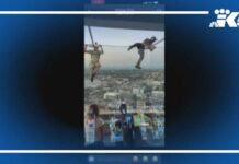 Witnesses capture the moment two men jump off the Space Needle
