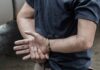 Naked Train Surfer Stuns Colorado person in handcuffs with hands behind back