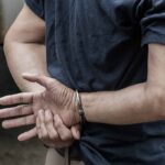 Naked Train Surfer Stuns Colorado person in handcuffs with hands behind back