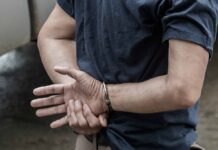 Naked Train Surfer Stuns Colorado person in handcuffs with hands behind back