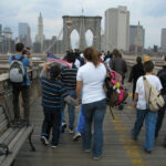 Brooklyn Bridge SHUTDOWN — Over a Selfie? People walking on the Brooklyn Bridge, New York City.